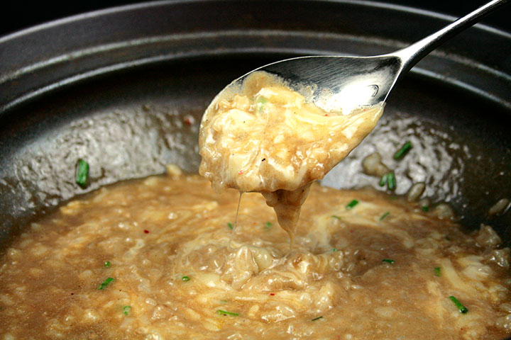 カレー風味のもつ鍋をチーズリゾットに